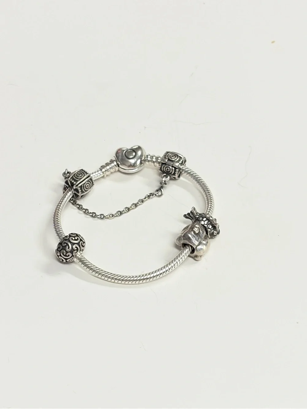 PANDORA Moments Sterling Silver Bracelet with Heart Clasp and charms